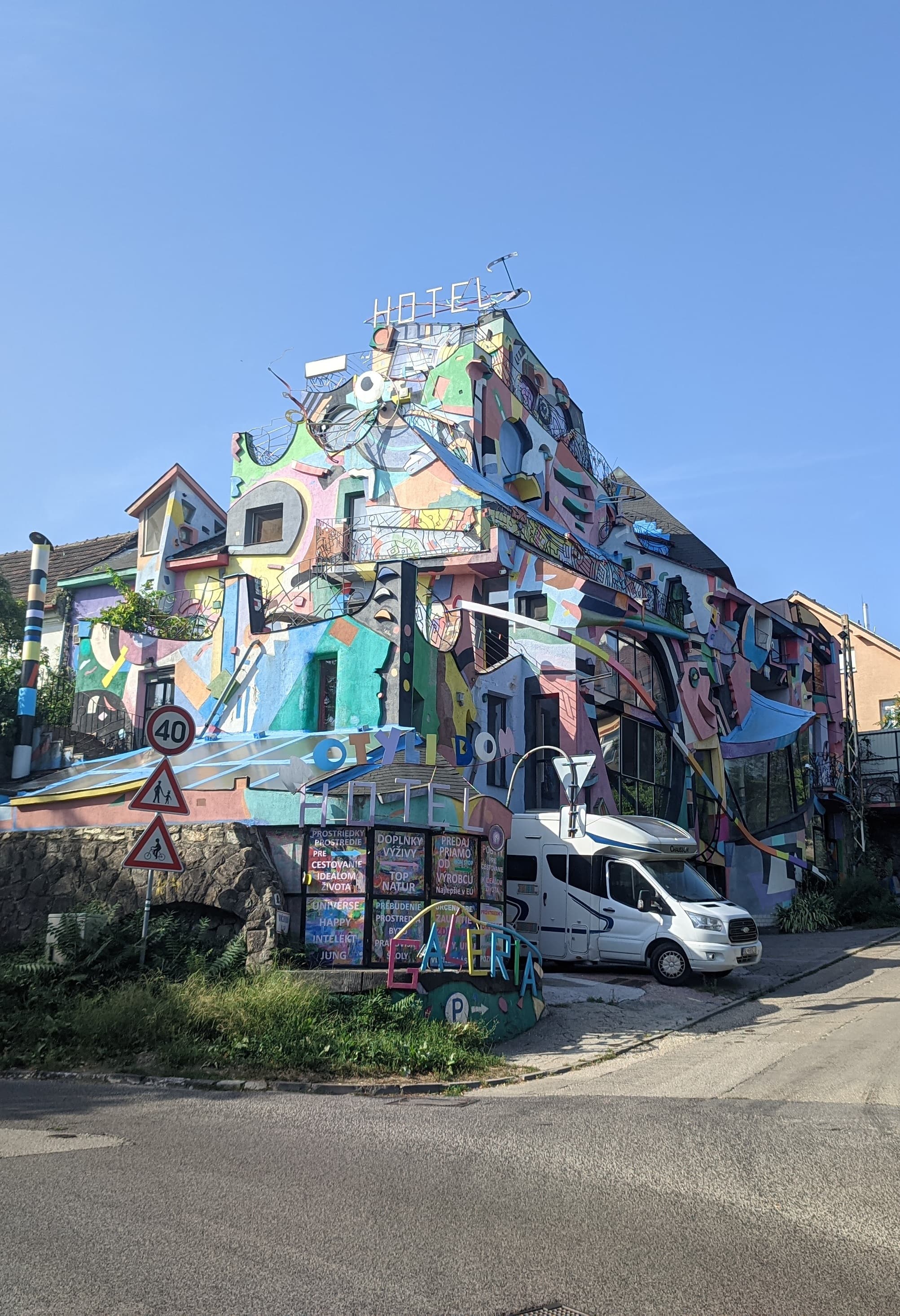 The colourful, mural-covered facade of the Hotel Arcus (Otyli Dom) in Bratislava