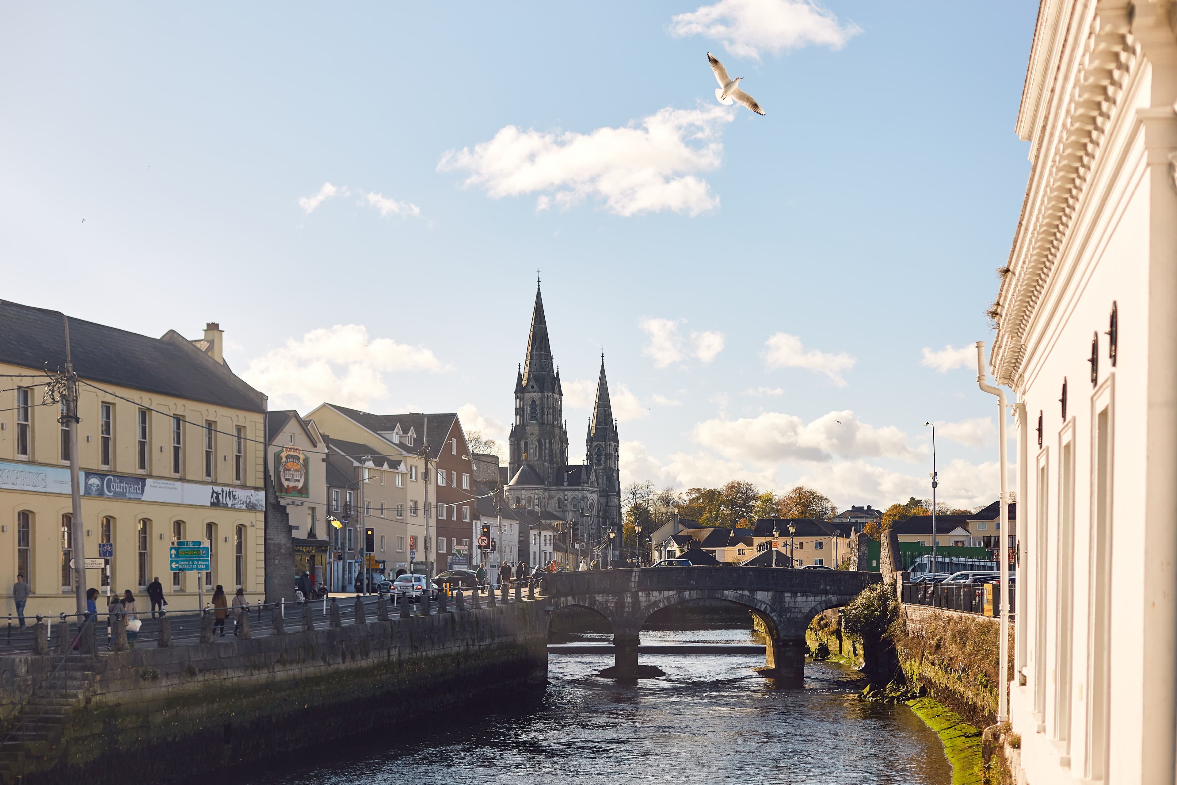 St Fin Barre's Cathedral spires over the River Lee in Cork, near the Cork City Marathon's St Patrick's Street start and finish area