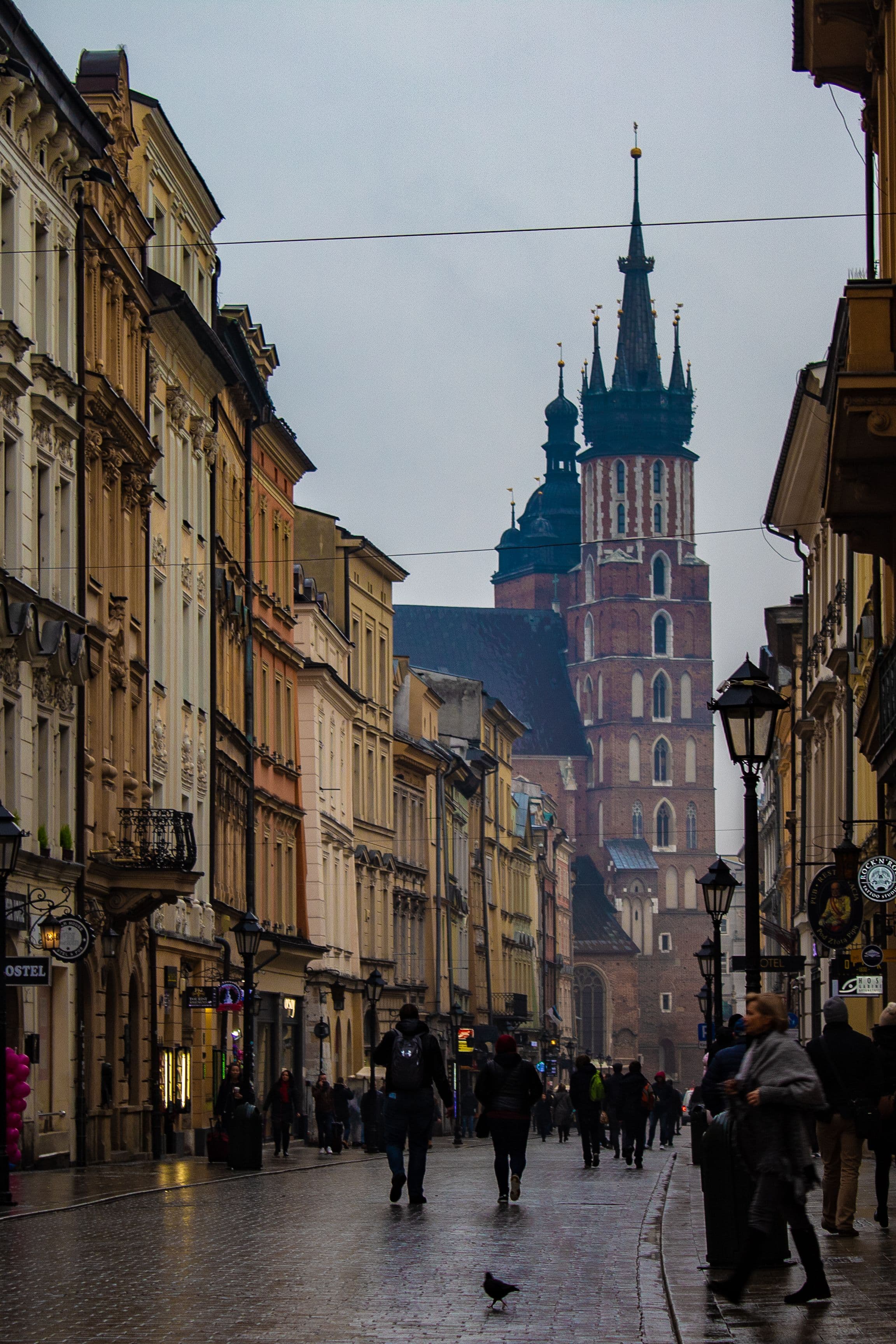 Floriańska Street in Kraków's Old Town, looking toward the twin towers of St Mary's Basilica