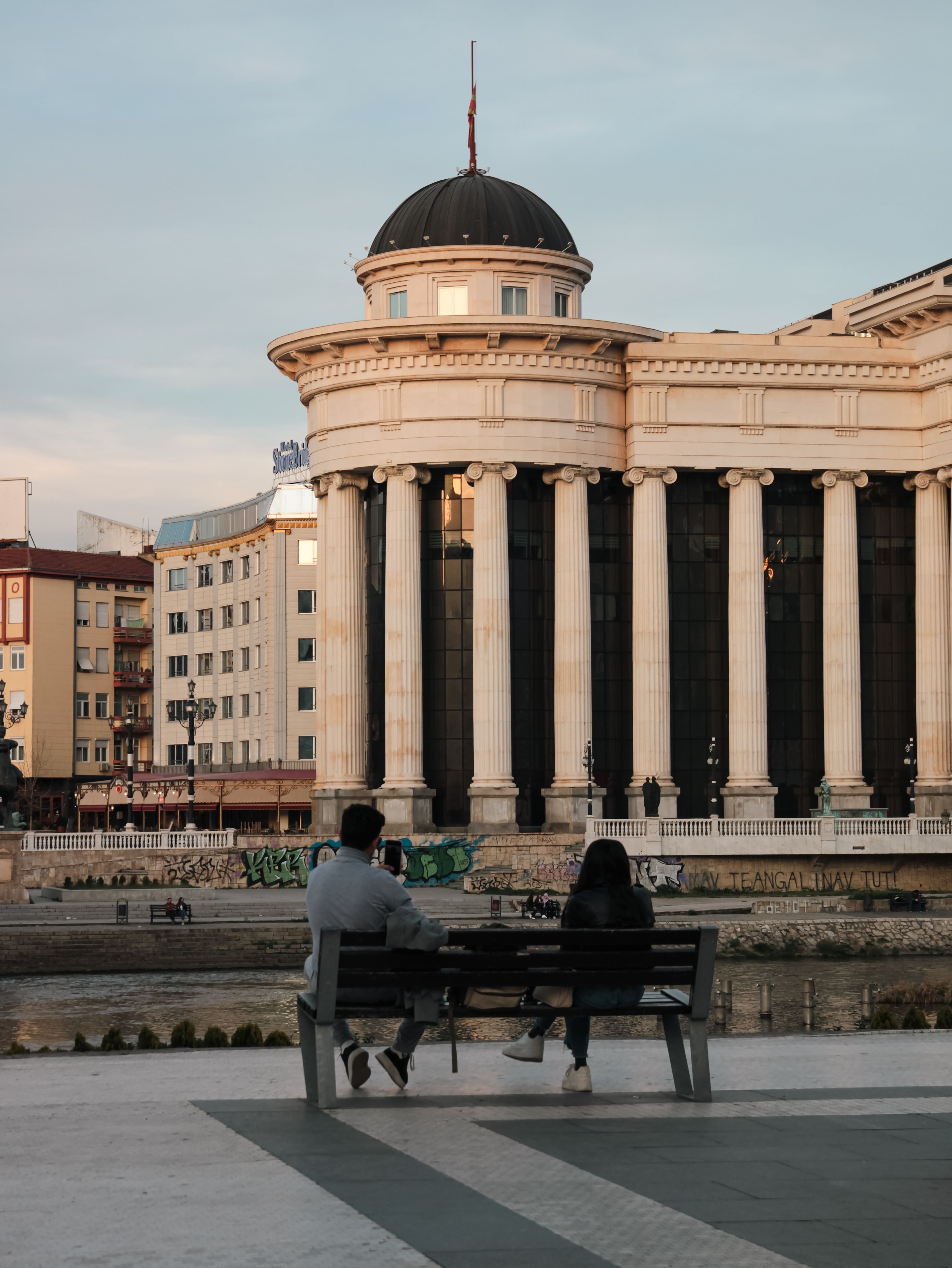 The Museum of the Macedonian Struggle on the Vardar riverbank in Skopje, a domed colonnaded building close to the marathon's finish area