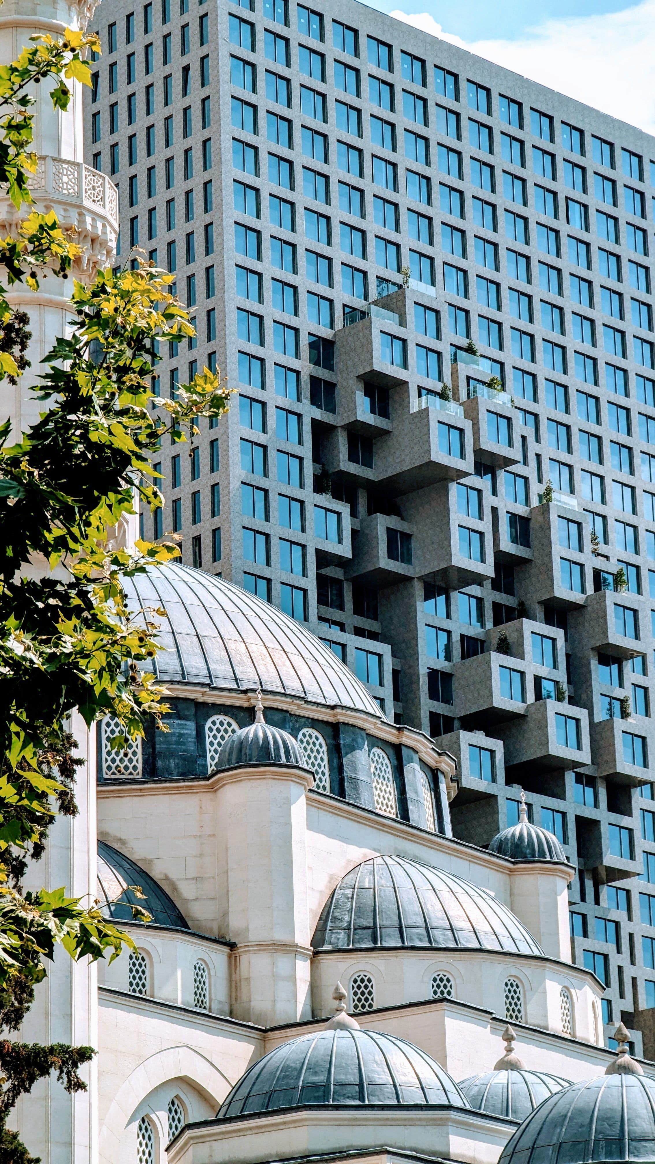 The Namazgah Mosque and a modern high-rise in central Tirana, both visible from parts of the marathon course