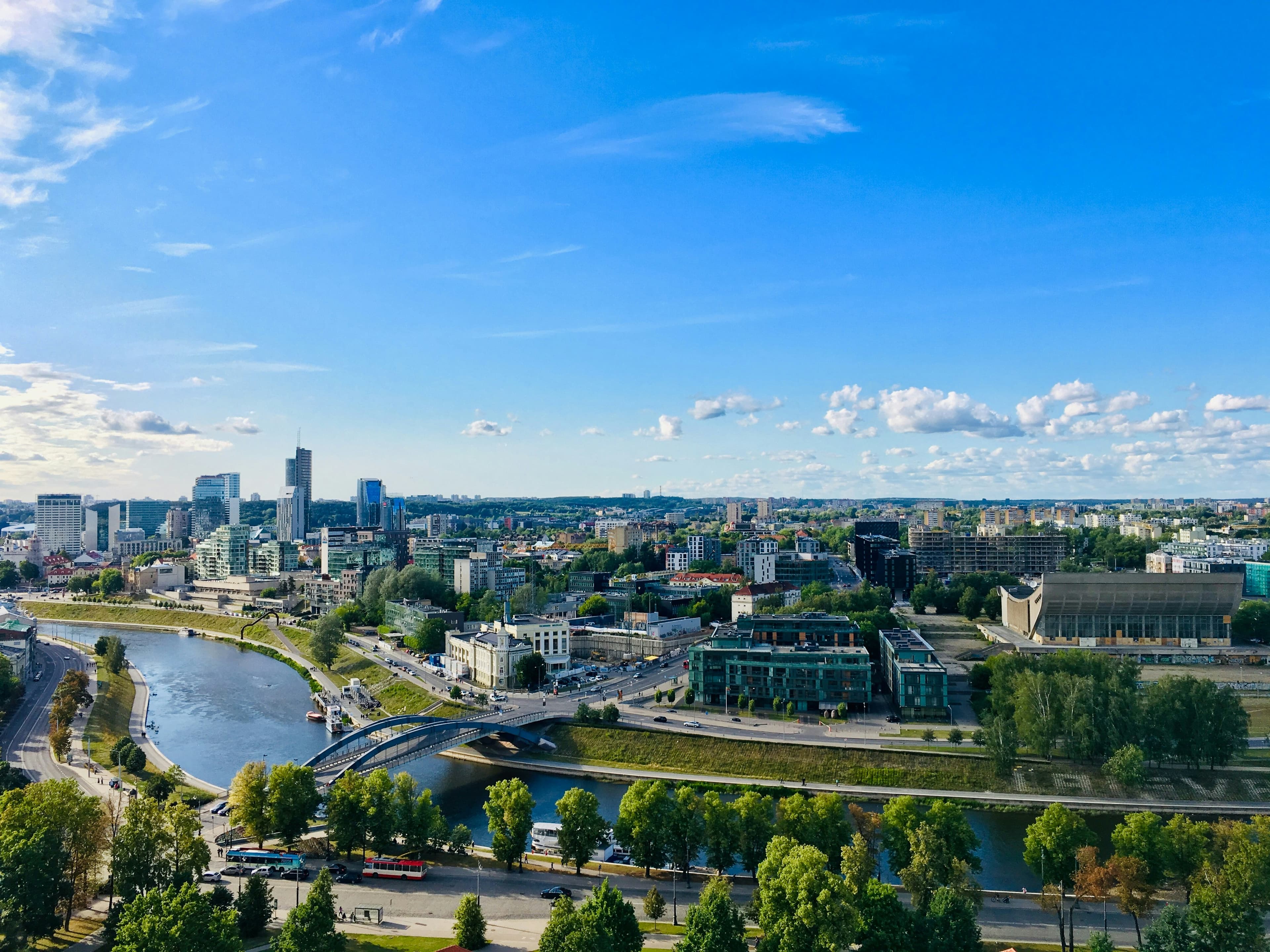 Vilnius skyline with the Neris riverbank, part of the marathon course, in the foreground